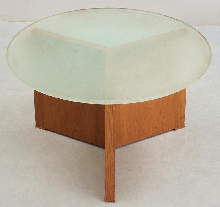 An elm sofa table attributed to Jacques Adnet, glass top.