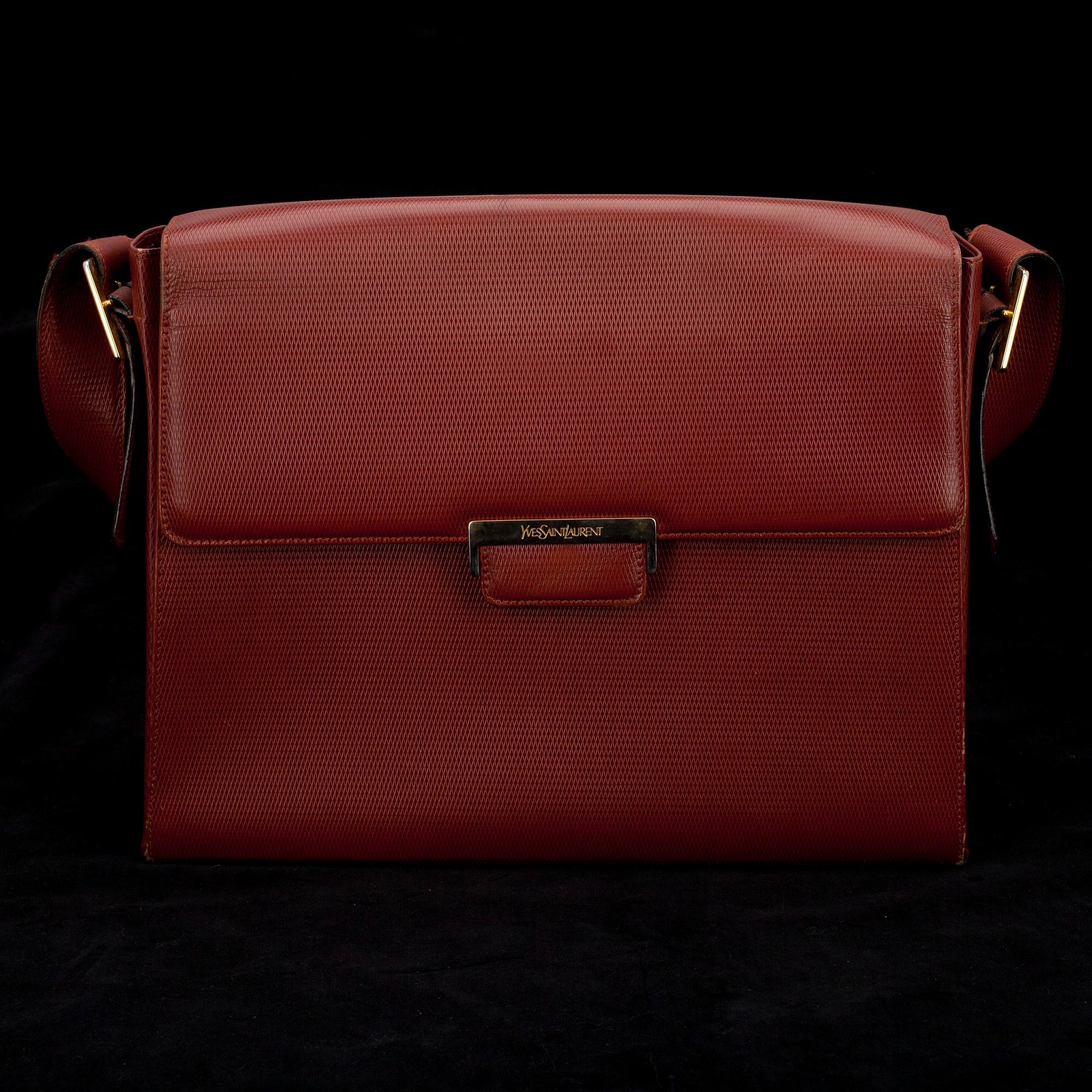 PORTFÖLJ, Yves Saint Laurent.