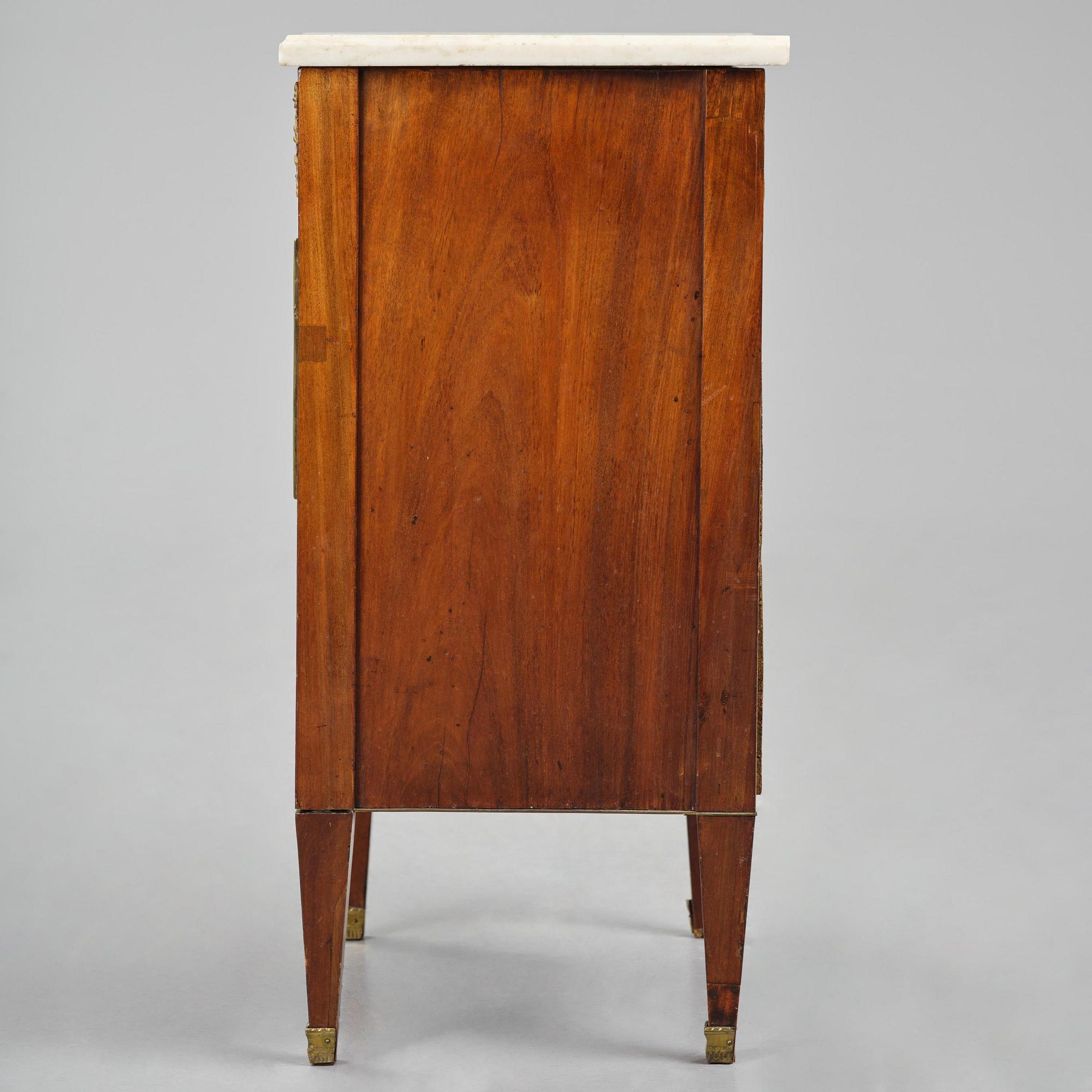 A late Gustavian mahogany commode, Stockholm, late 18th century.