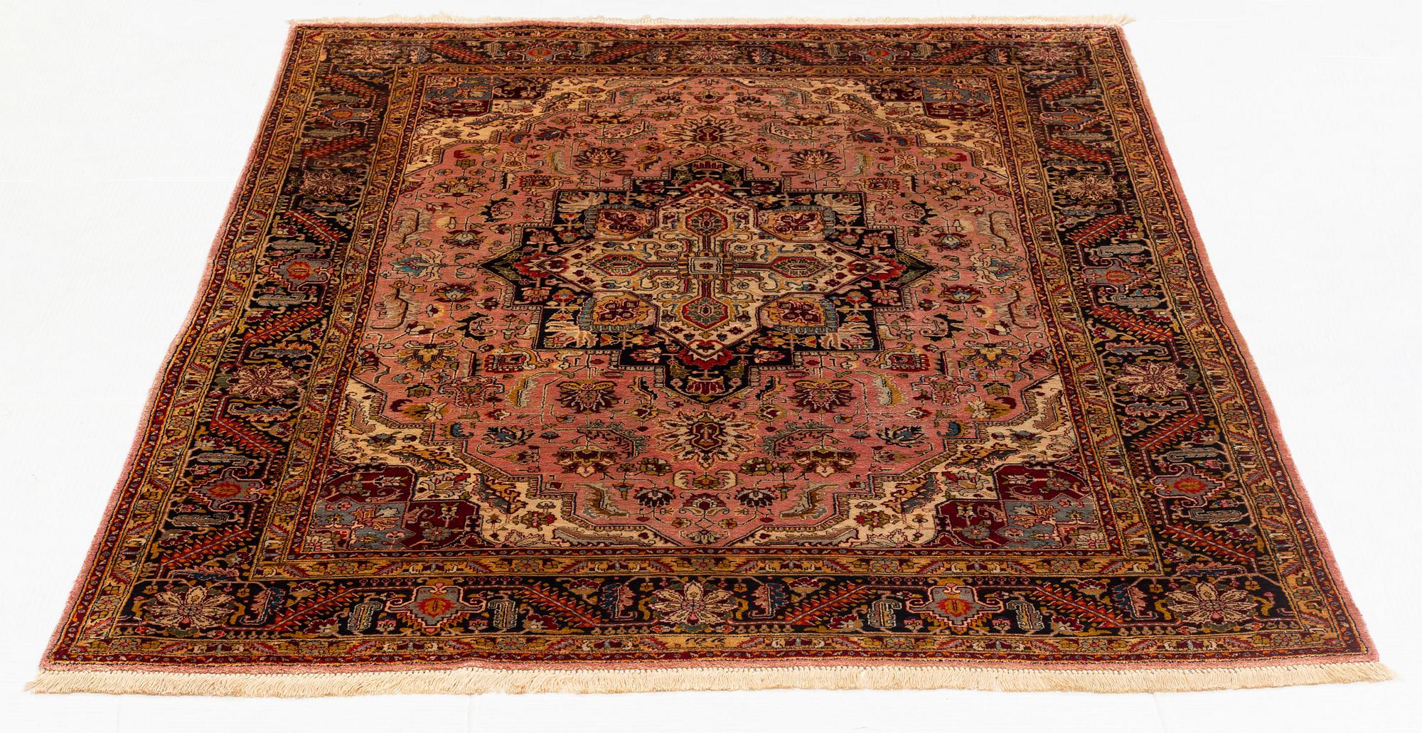 A rug, old, silk Tabriz, signed, ca 201 x 140 cm.