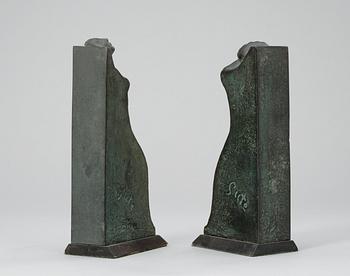 A pair of Axel Gute patinated bronze bookends, Sweden 1920's.