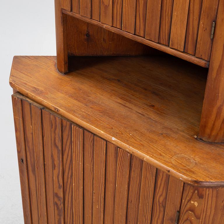 Göran Malmvall, attributed, a pine corner cabinet, Karl Andersson & Söner, mid 20th century.