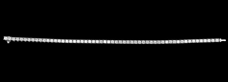 RANNERENGAS, briljanttihiottuja timantteja n. 7.00 ct. H/ si 18K valkokultaa. Pituus 18,5 cm, paino 15 g.