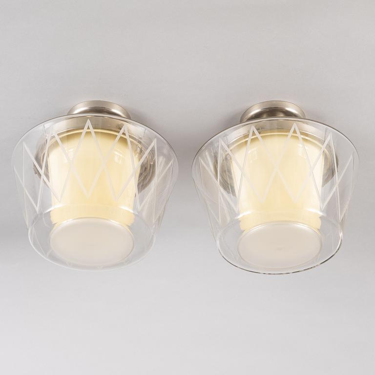 Harald Notini, a pair of ceiling lamps, model "11197", Arvid Böhlmarks 1940s-50s.