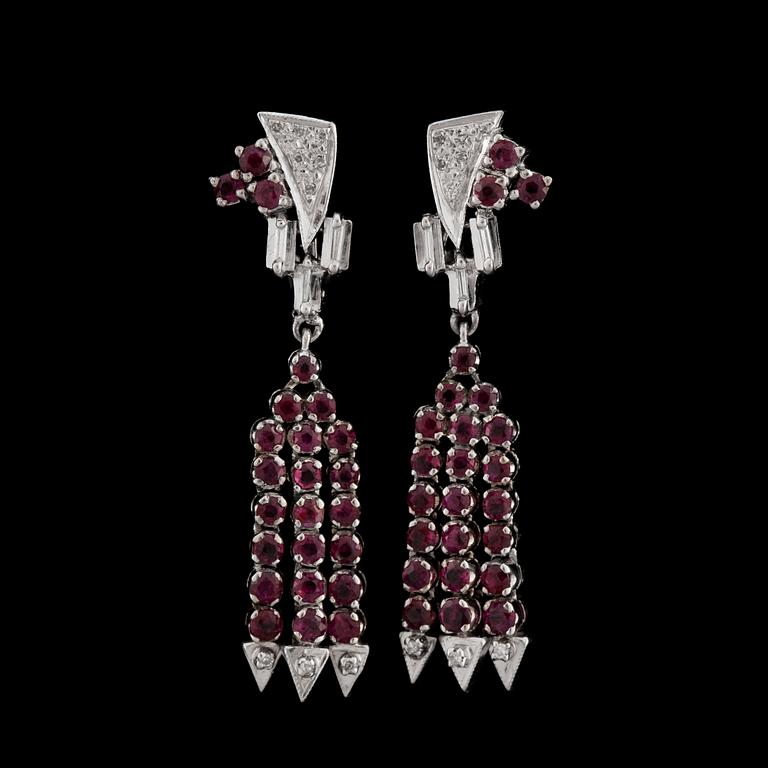 A pair of ruby app. tot. 3 cts and diamond app tot. 0.25 cts. earrings.