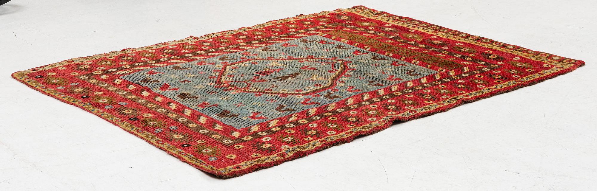 A bed cover, so called 'Bridal rya' c. 173 x 143 cm, dated 1828.