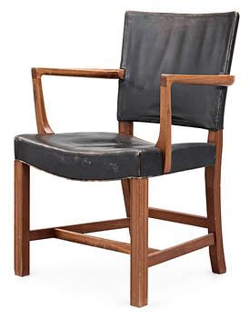 A Kaare Klint mahogany and black leather armchair by Rud Rasmussen snedkerier, Denmark.