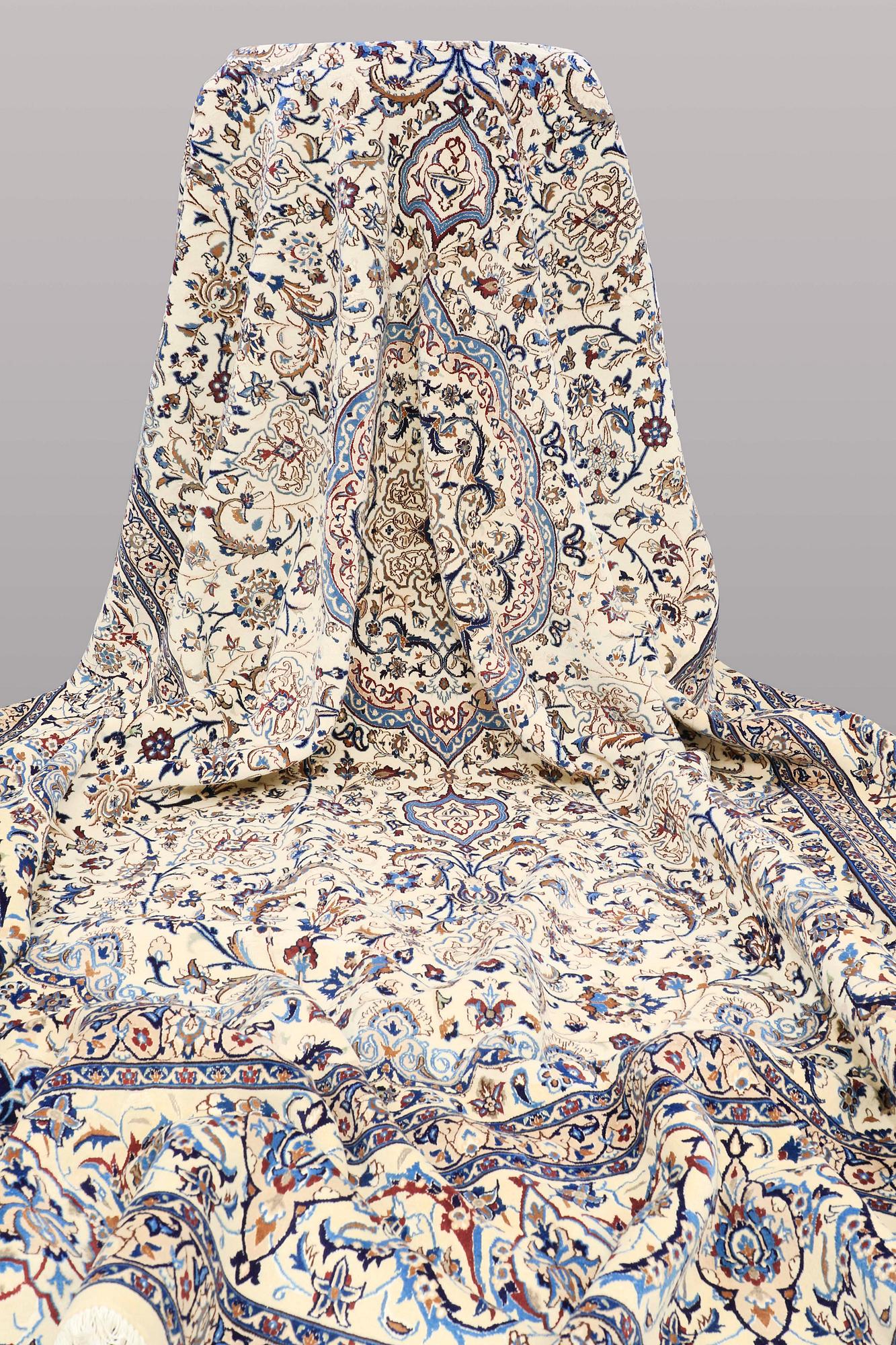 A CARPET, Nain part silk, s.k 9 LAA, 588 x 393 cm.