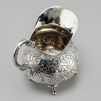 A silver sugarbowl, a cream jug and a tray by J L Hultman, Stockholm, mid 20th century.