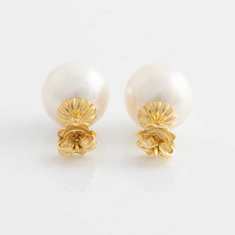 Earrings with cultured South Sea pearls.