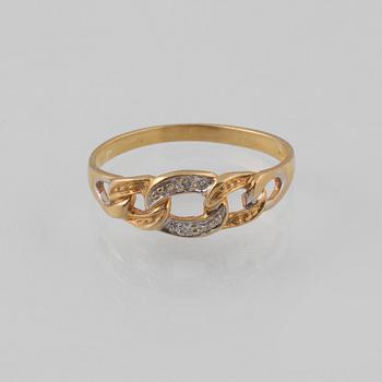 RING, 18K guld och vitguld med 2 åttkantslipade diamanter, Kattfotstämplad. Vikt 1,8 gram.