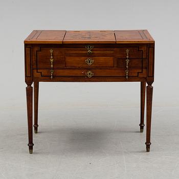 An end of the 18th century dressing  table with drawers and mirror.