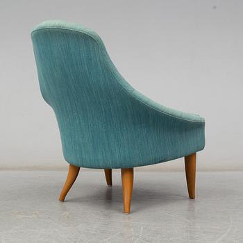 KERSTIN HÖRLIN-HOLMQVIST, a 'Lilla Eva' easy chair, for Nordiska Kompaniet, mid 20th century.