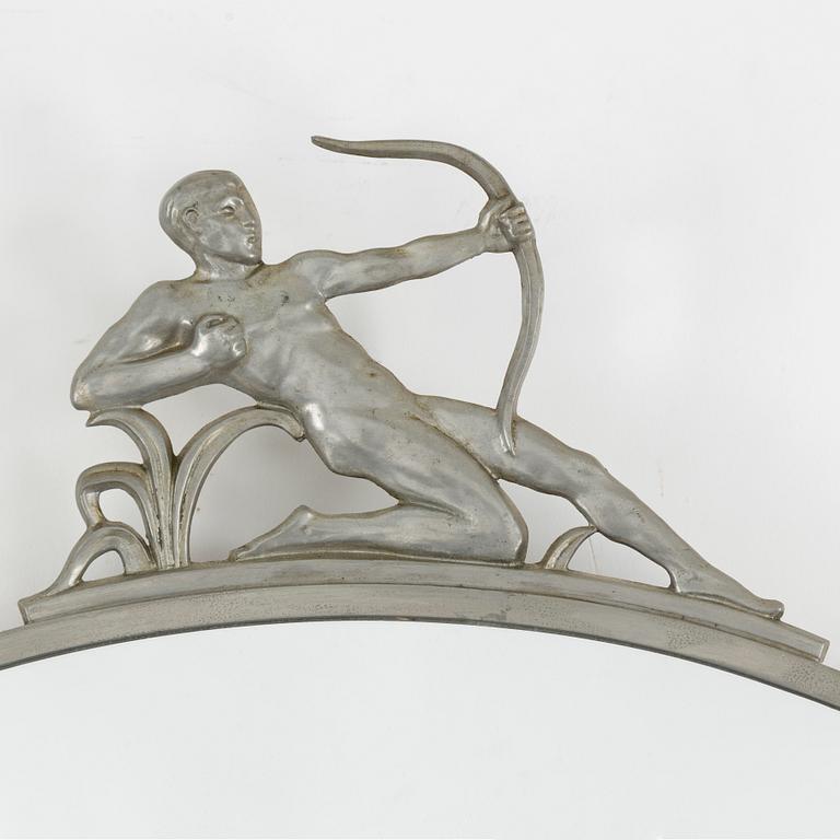 A PEWTER MIRROR, first half of the 20th century.