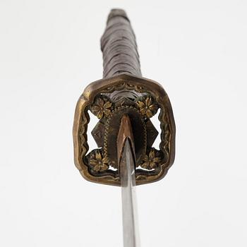 A Japanese sword, 20th century mounting.