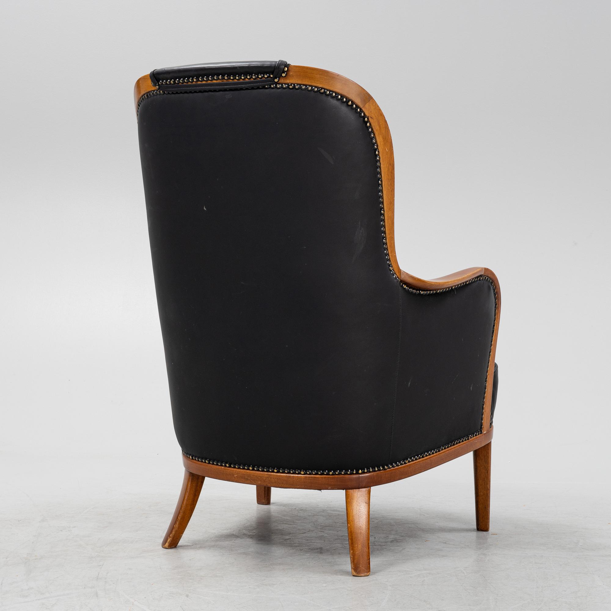 Carl Malmsten, a mahogany 'Advokaten' armchair.