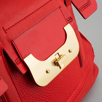 Diane von Fürstenberg a red leather handbag and wallet.