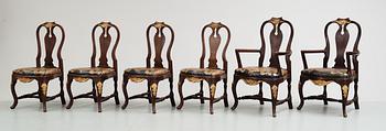 96. A set of 12 rococostyle chairs, 20 th century.