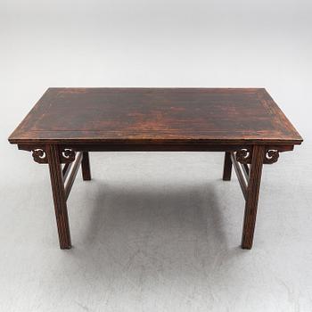 A Chinese wooden table, 20th century.