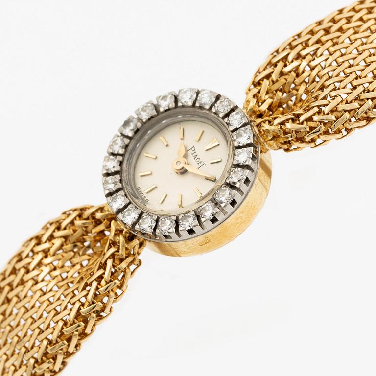 Piaget, armbandsur 18K guld och runda briljantslipade diamanter med länk av W.A. Bolin.