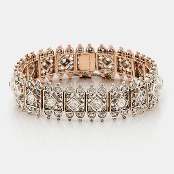 A tiara/bracelet set with old and rose cut diamonds.