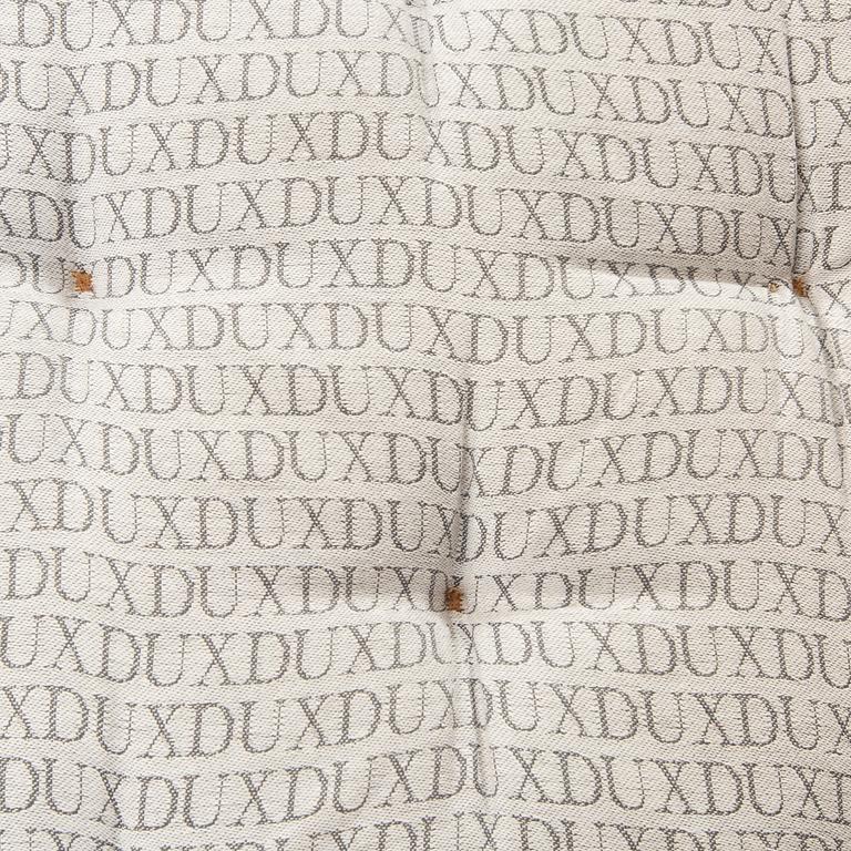 A Bruno Mathsson "Pernilla" leather easy chair for DUX later part of the 20th century.