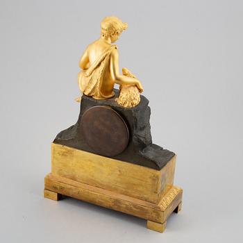 An empire mantel clock, first half of the 19th century.