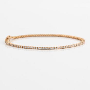 Tennisarmband 14K guld med runda briljantslipade diamanter.