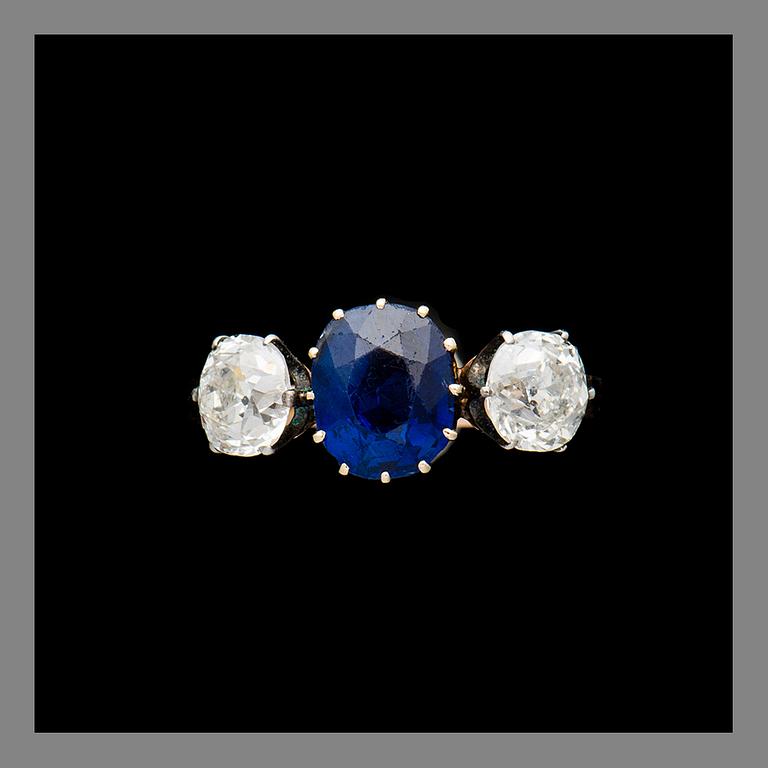 A RING, 14K (56) gold, sapphire, old cut diamonds. Assay mark Ivan Lebedkin, Moscow. Weight c. 2.4 g.