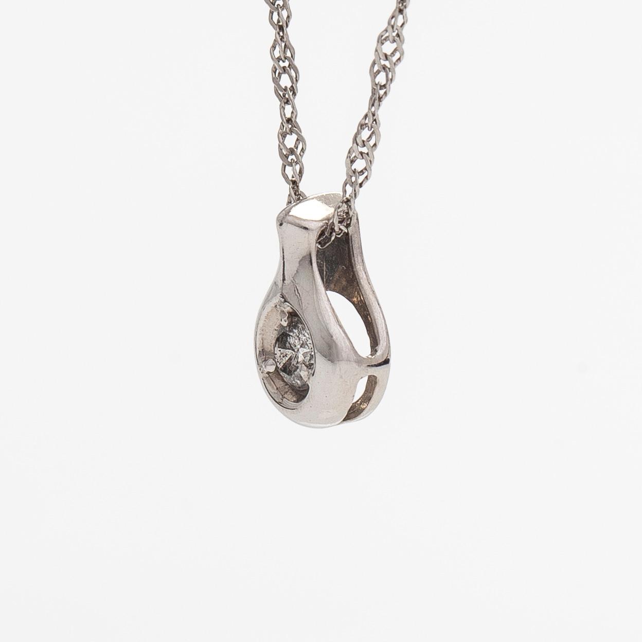 A platinum necklace, with a round brilliant-cut diamond ca. 0.10 ct.