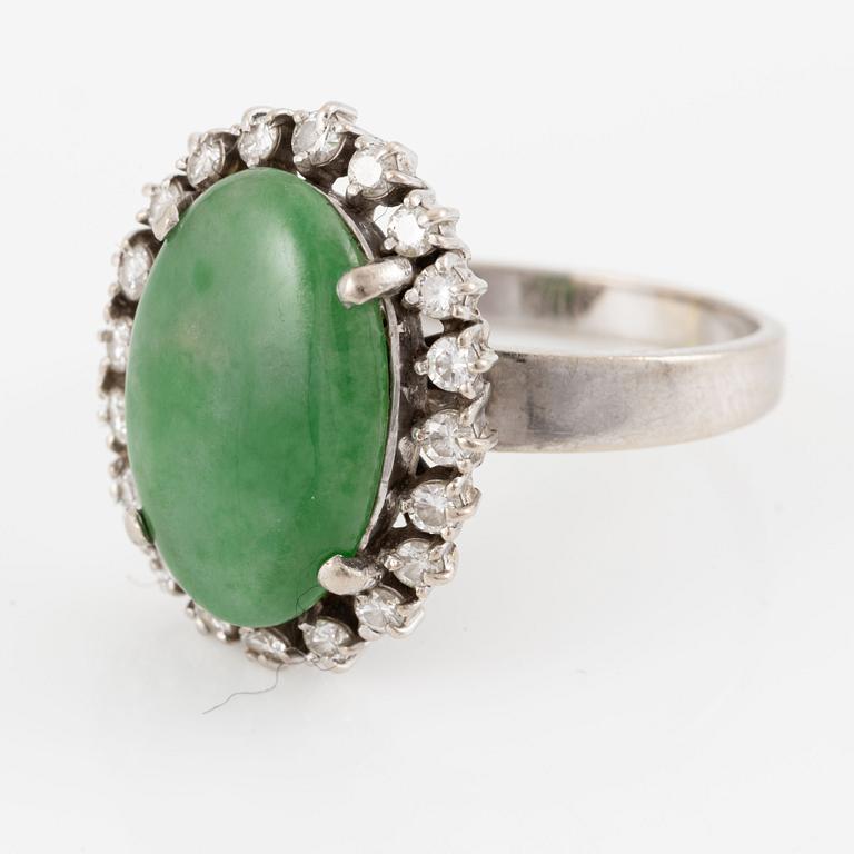 Ring, 14K white gold set with cabochon-cut probably jadeite and small brilliant-cut diamonds.