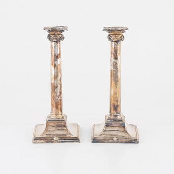 A pair of silver-plate candlesticks, early 20th century.
