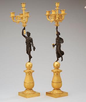 A pair of French Empire early 19th century five-light candelabra.