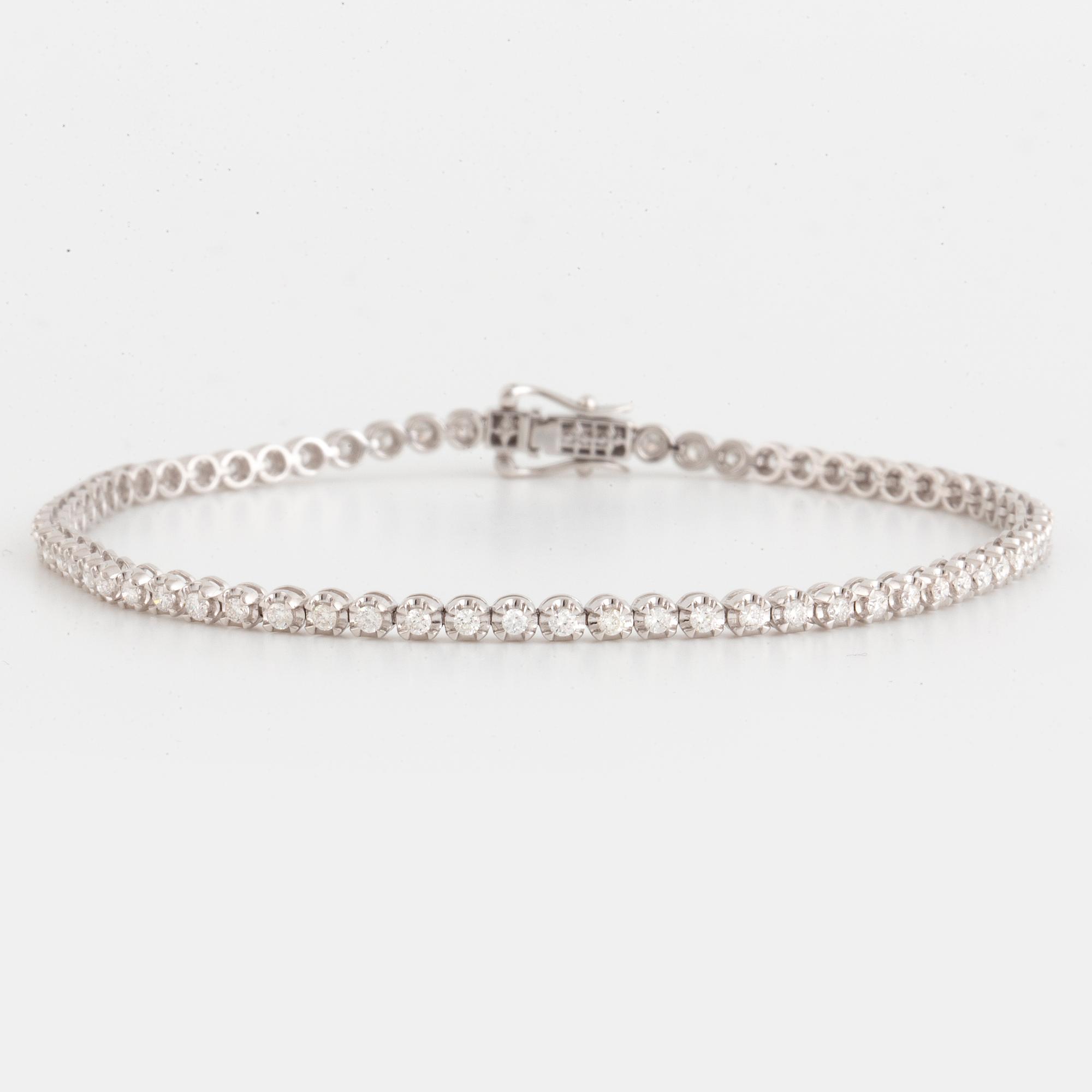 TENNISARMBAND, med briljantslipade diamanter.