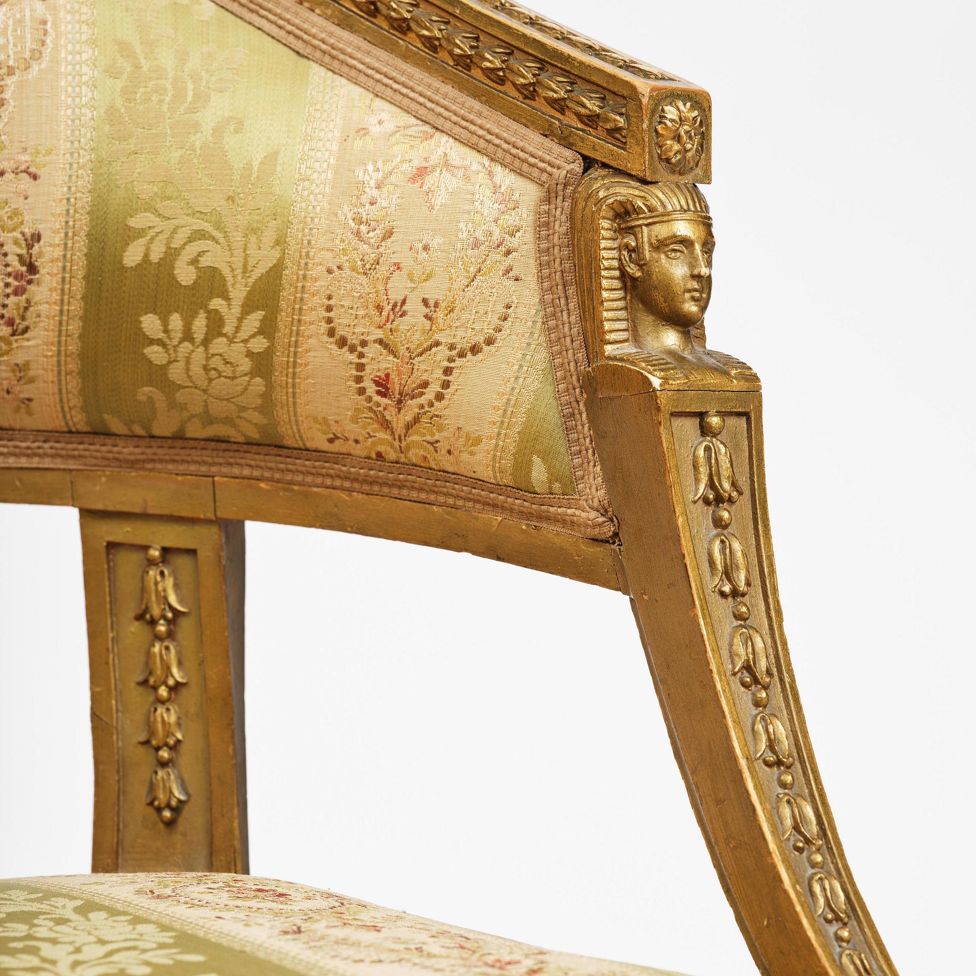 A pair of late Gustavian open armchairs attributed to E. Ståhl (master in Stockholm 1794-1820).