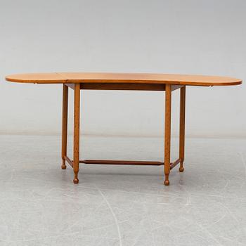 JOSEF FRANK, a model 1333 mahogany table from Firma Svenskt Tenn.