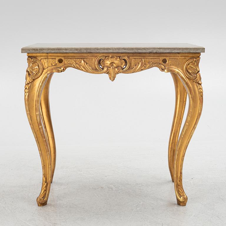 A Swedish rococo-style giltwood table, Stockholm, 19th century.