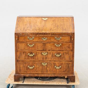 A walnut and mahogany writing bureau, mid-18th century late Baroque.
