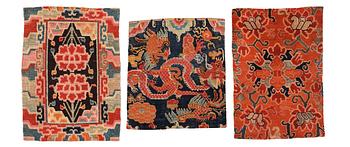 1341. A set with three small Tibetan wool rugs, Qing dynasty, late 19th Century.