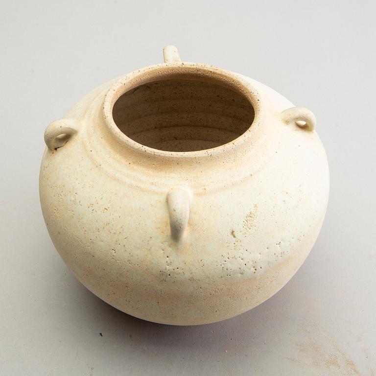 A white glazed South East Asian jar, presumably Sawankhalok, 15th Century.