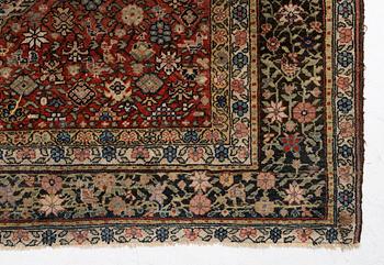 A Bakhtiari carpet, signed, c. 580 x 212 cm.