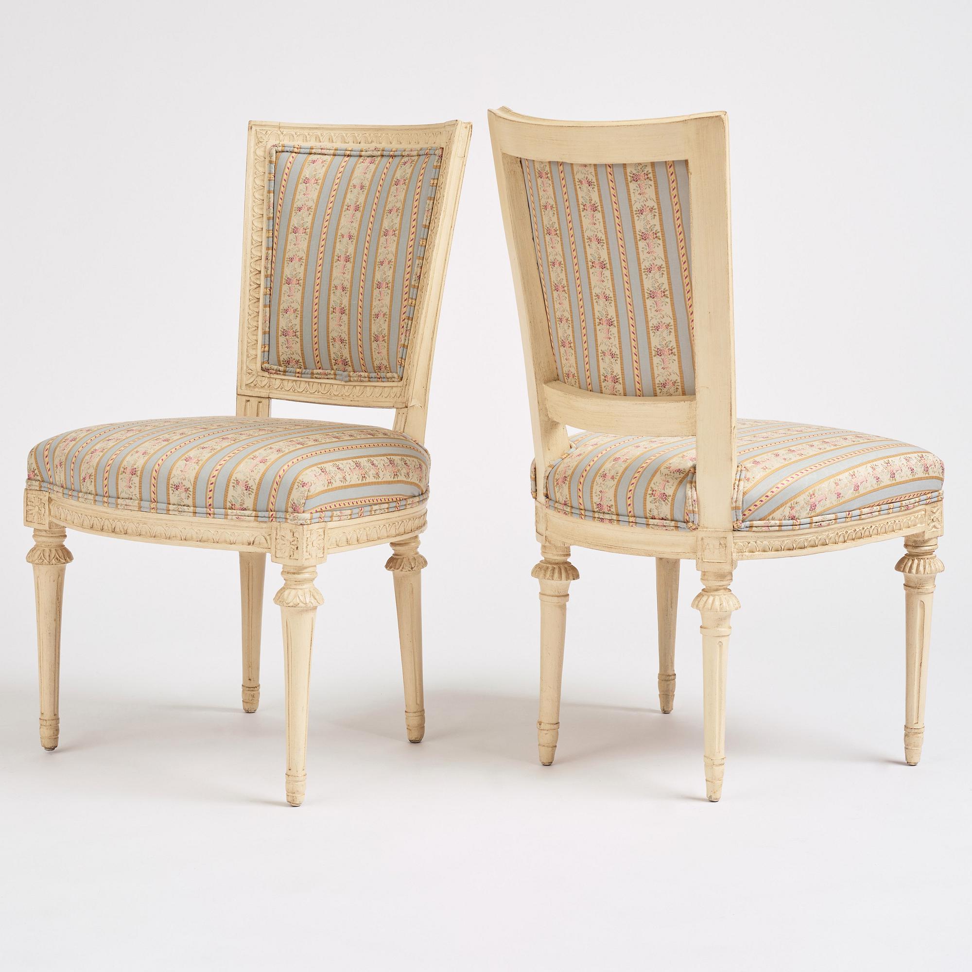A set of nine Gustavian chairs by A Hellman (master in Stockholm 1761-94) and E Ståhl (master in Stockholm 1794-1820).