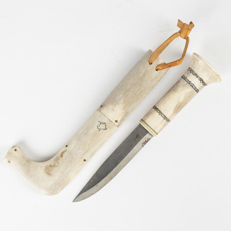 A reindeer horn knife attributed to Ante Jönsson, signed.