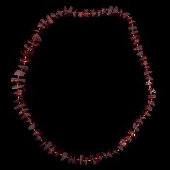 HALSSMYCKEN, bijouteri, 2 med bernsten en med diverse smyckesstenar. 1900-tal.