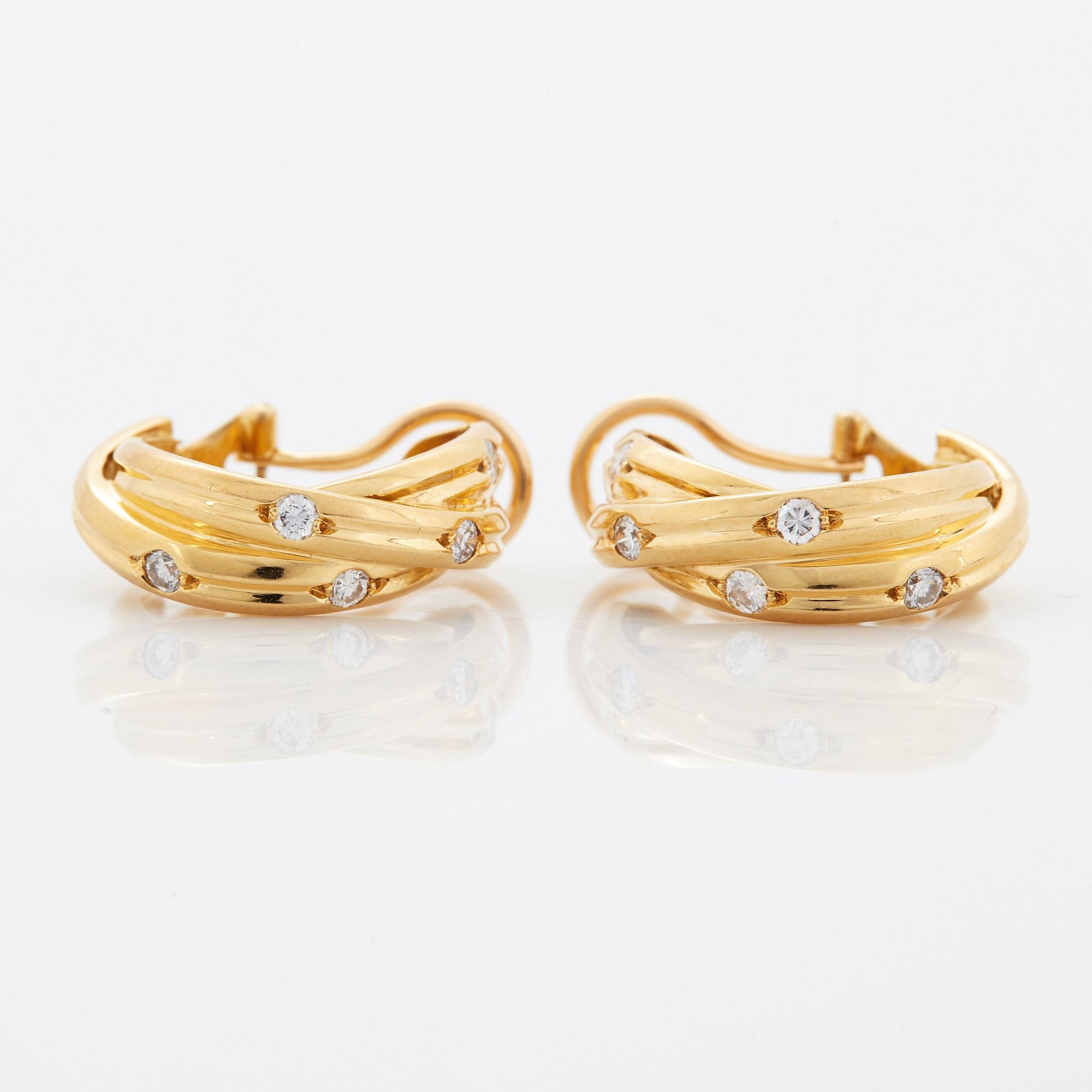 Cartier ett par örhängen "Trinity" 18K guld med runda briljantslipade diamanter.