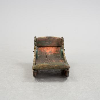 A childrens sleigh middle european dated 1709.