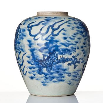 A blue and white Transitional jar with a four clawed dragon, 17th Century.