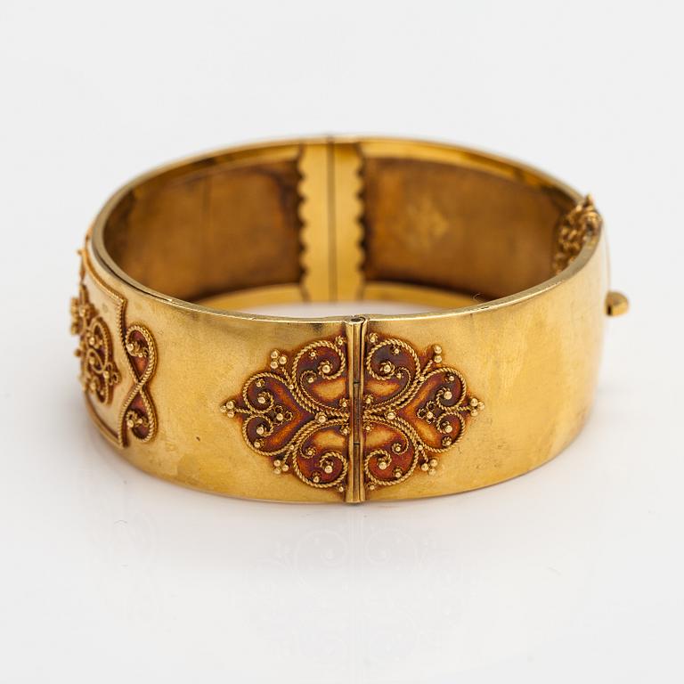 Rannekoru, 18K kultaa. Gustaf Dahlgren, Malmö 1872.
