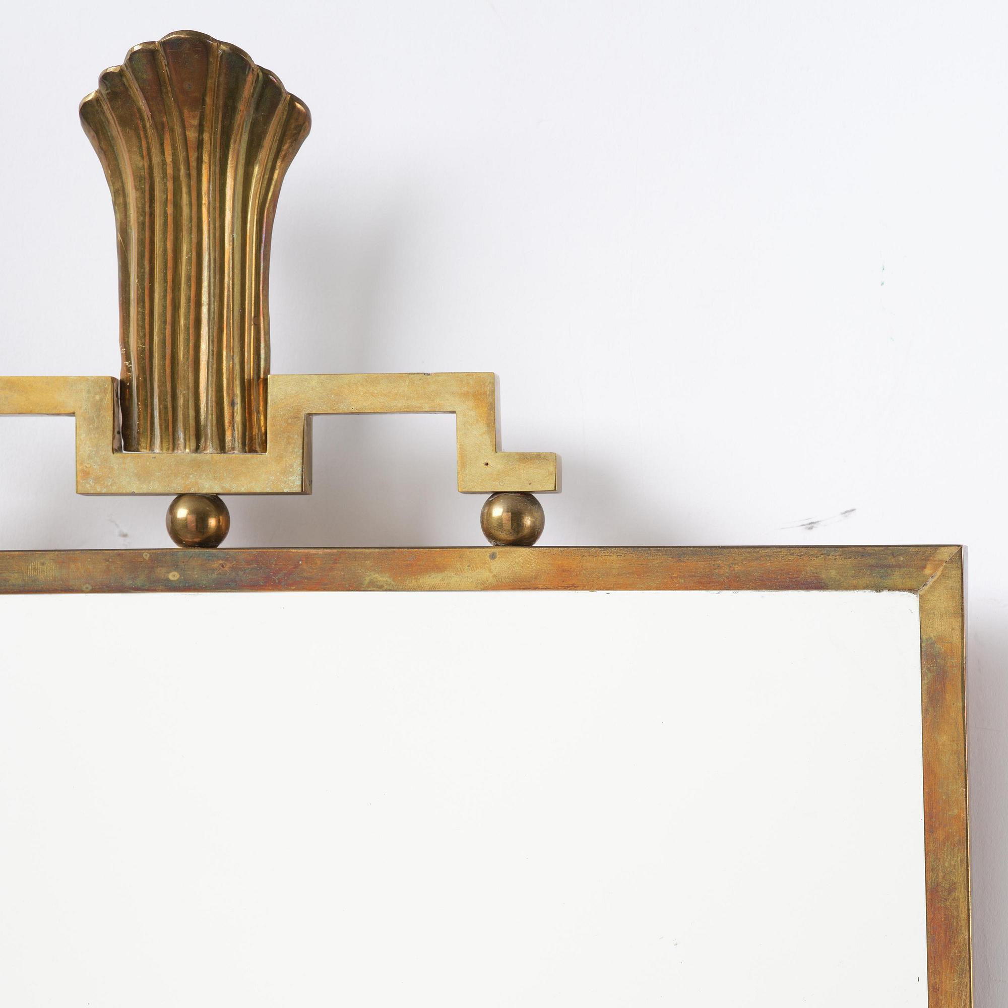 Lars Holmström, a Swedish Grace brass wall mirror, Arvika, 1920-30s.