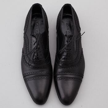 LOUIS VUITTON, a pair of black leather brogues, size 9½.